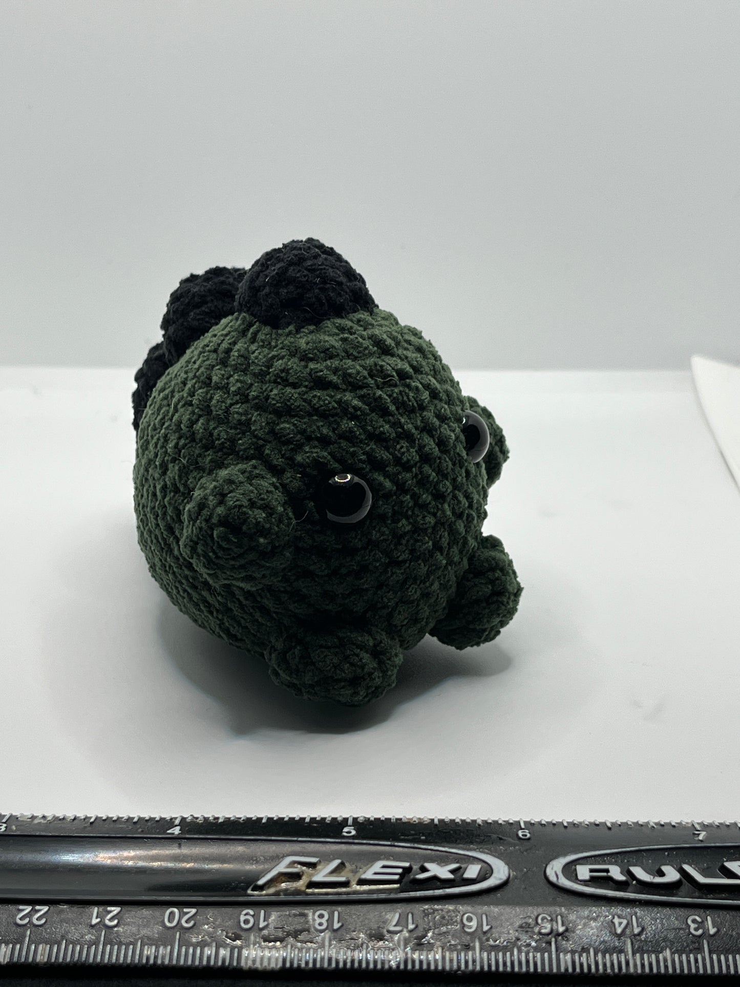 Crocheted chubby little Dino
