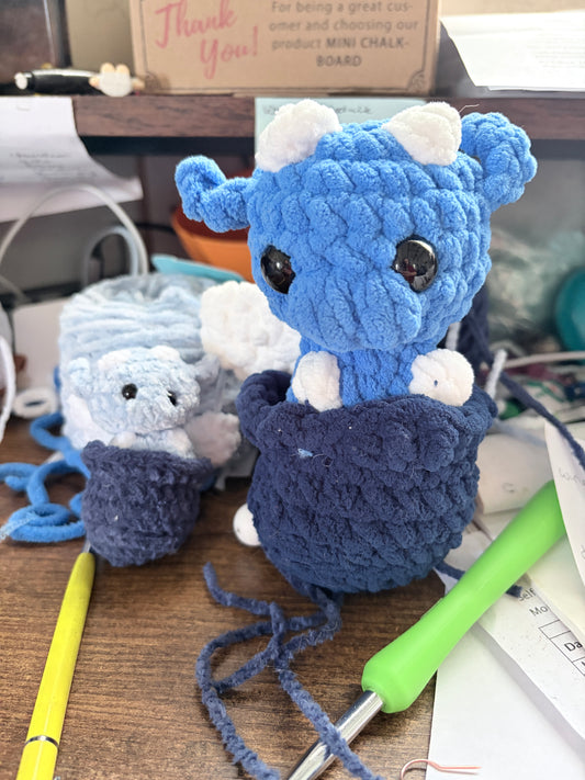 Crocheted hatching dragons